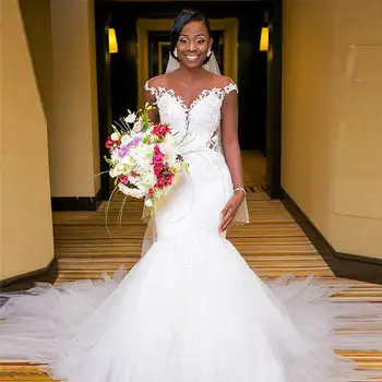 Сватбена рокля Русалка Булчинската рокля без презрамки, дантела с аппликацией във формата на сърце От Бял Тюл Африкански халати 2024